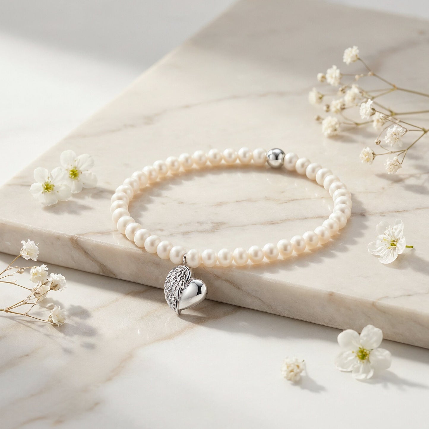 Armband 925er Silber Herzflügel mit Süßwasserperlen